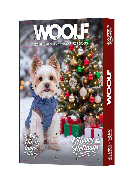 Vovseland Woolf dog advent calendar featuring a cute puppy in a blue sweater in front of a decorated Christmas tree.